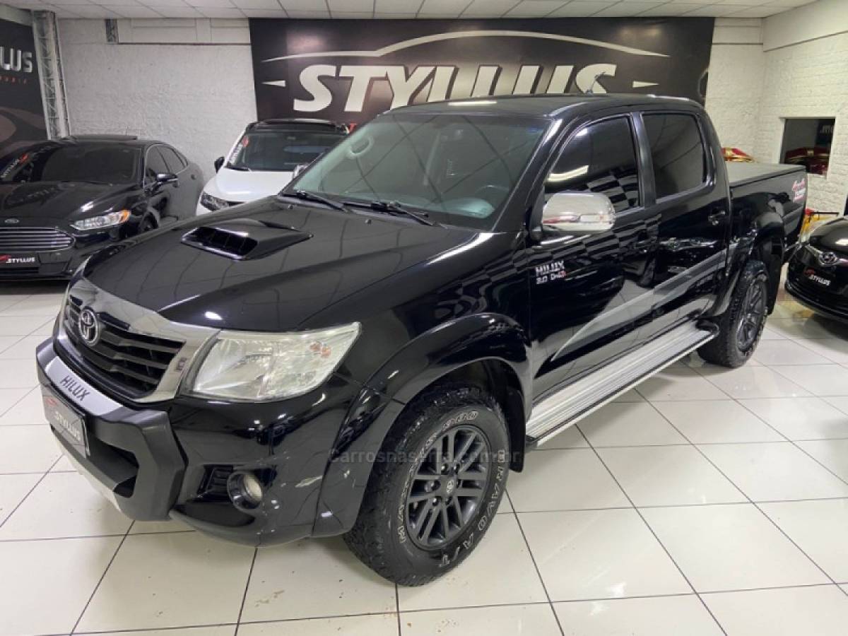 TOYOTA - HILUX - 2012/2013 - Preta - R$ 113.900,00