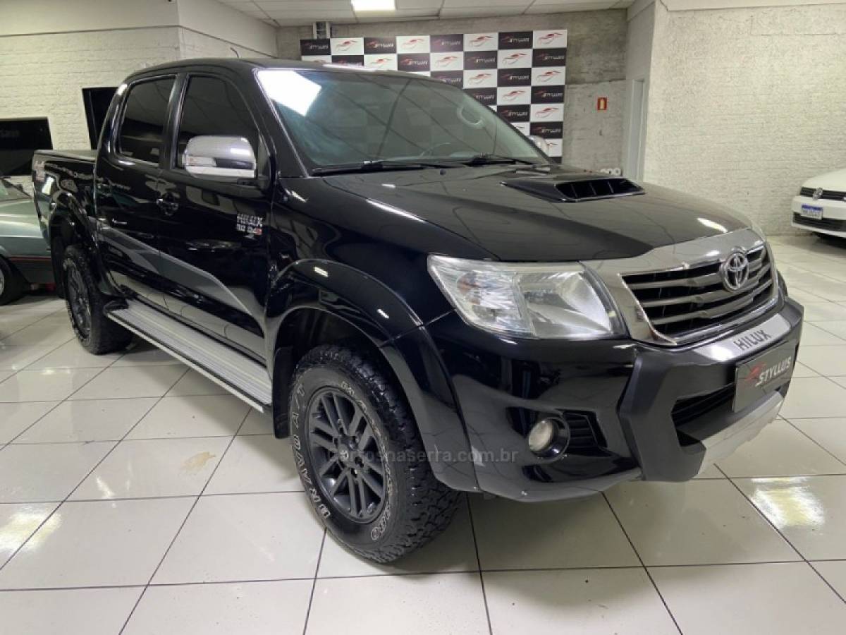 TOYOTA - HILUX - 2012/2013 - Preta - R$ 113.900,00